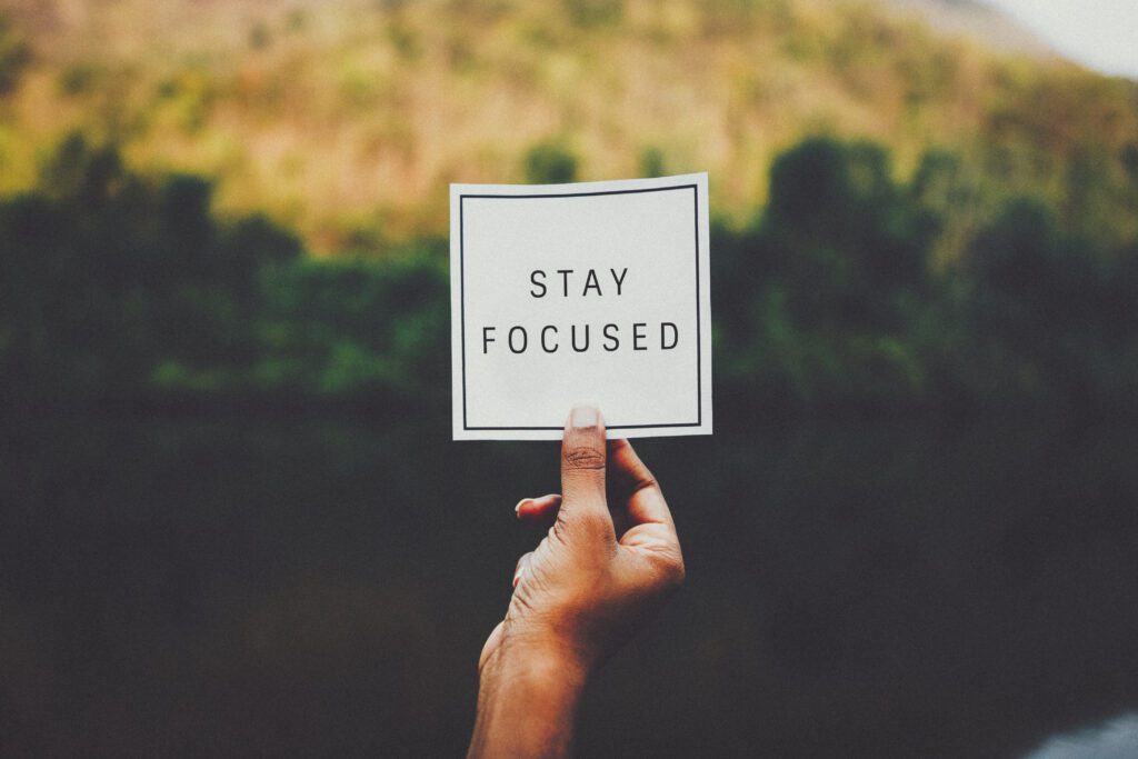 Stay focused wallpaper background inspirational quote, retro tone filter